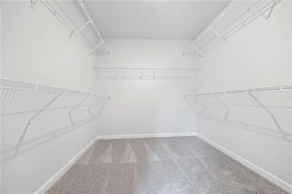 a view of a room with racks on the wall