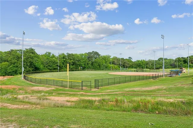 a view of a big yard with a large pool
