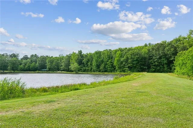 a view of a lake from a yard