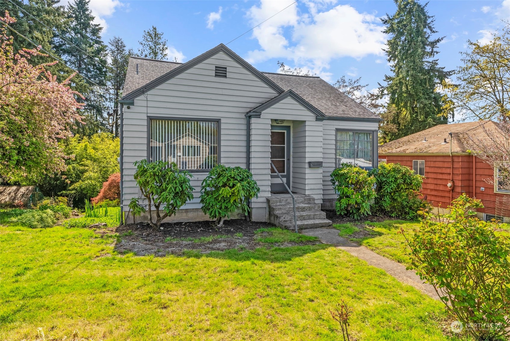502 Burcham Street Kelso, WA 98626 - Photo 1 of 38 a front view of a house with a yard