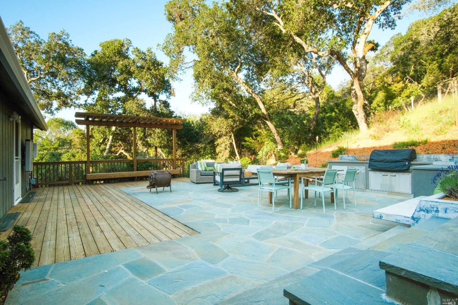 an outdoor space with patio and sitting space