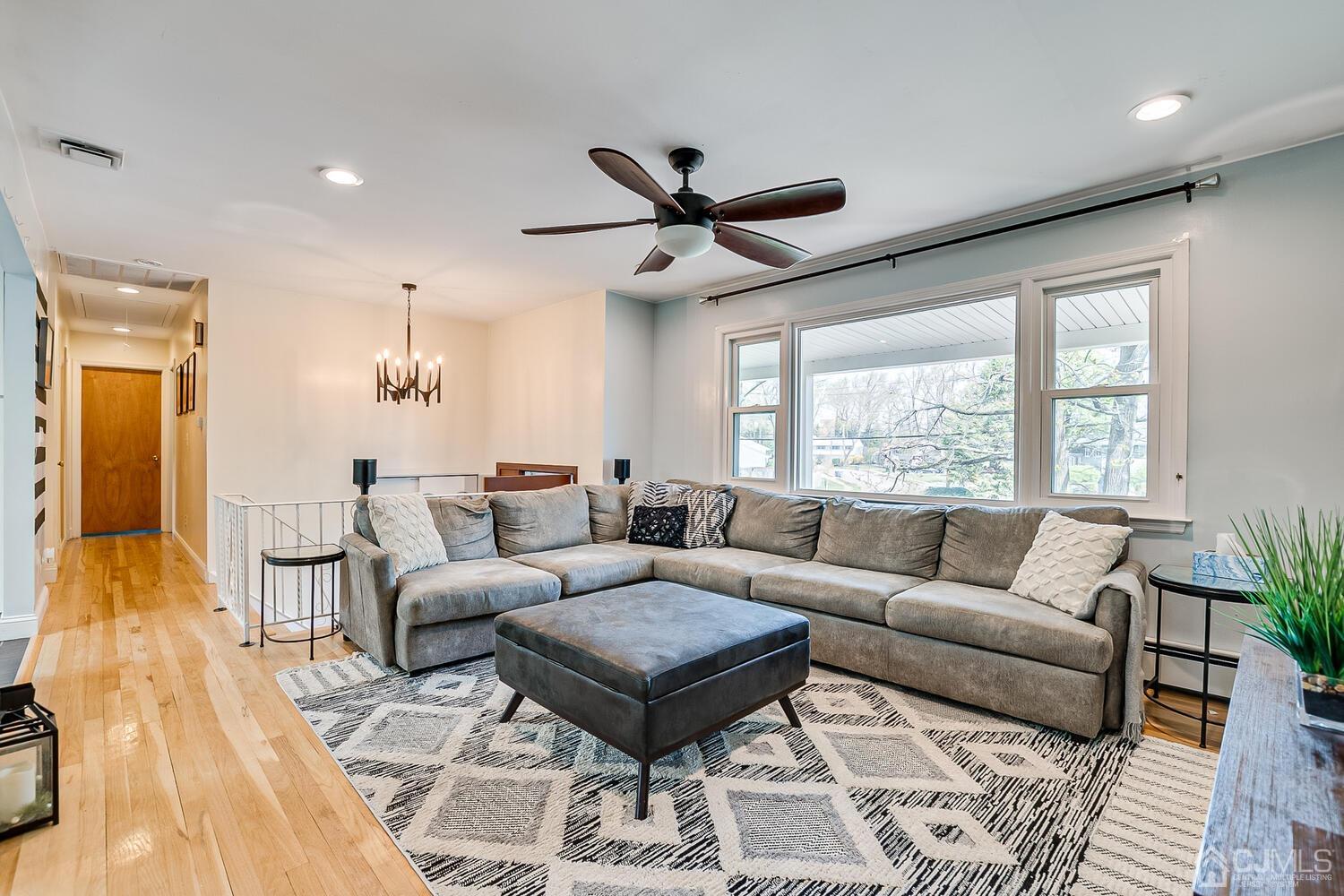 20 Homestead Road Metuchen, NJ 08840 - Photo 13 of 49 a living room with furniture and a large window