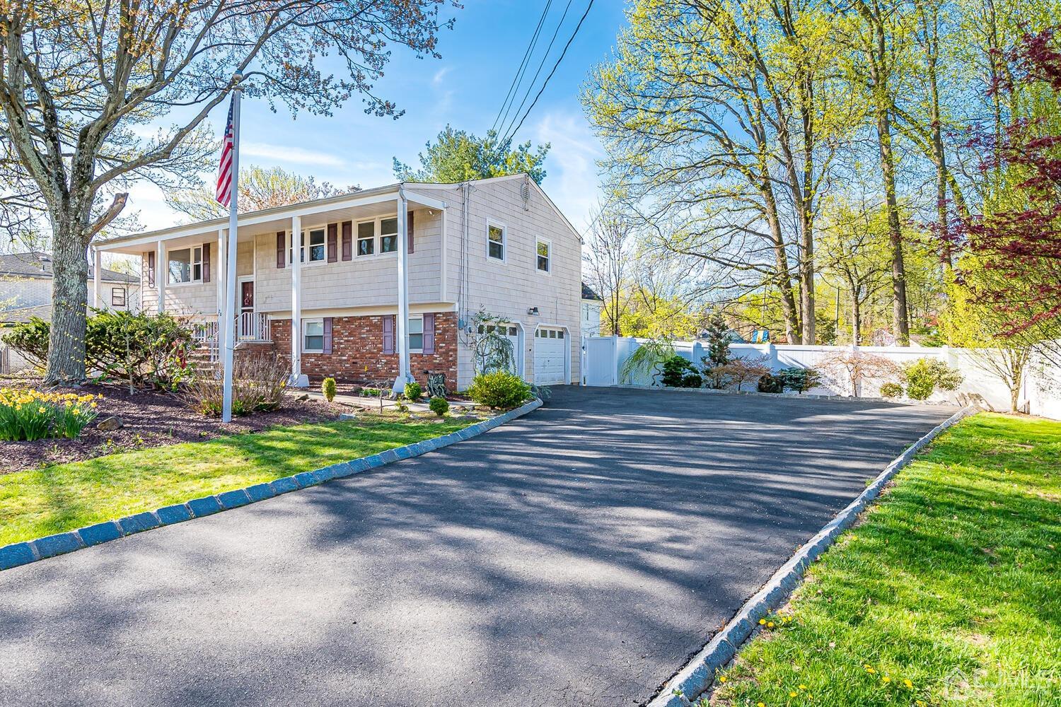 20 Homestead Road Metuchen, NJ 08840 - Photo 2 of 49 a view of house with yard and swimming pool