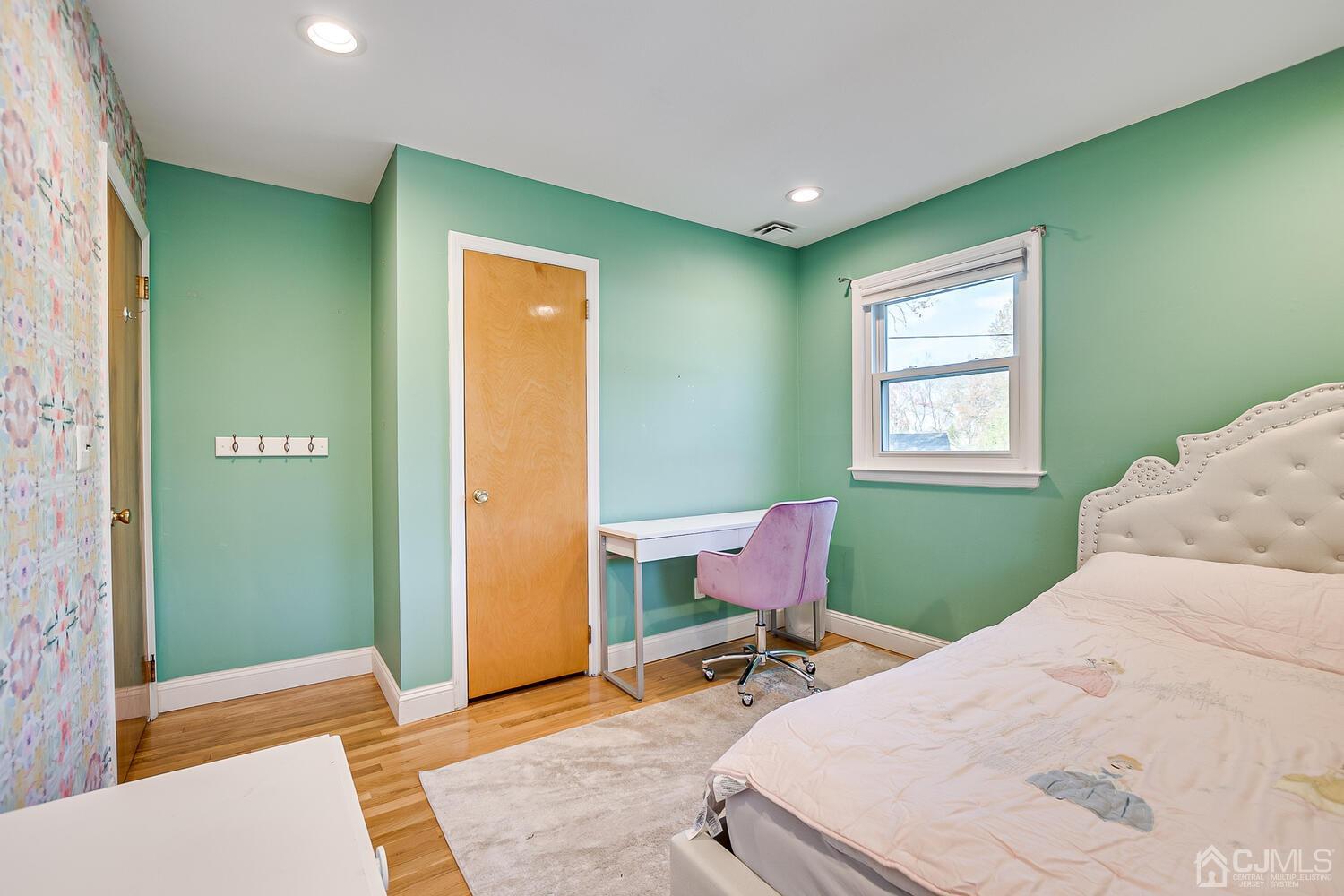 20 Homestead Road Metuchen, NJ 08840 - Photo 27 of 49 a living room with furniture and a window