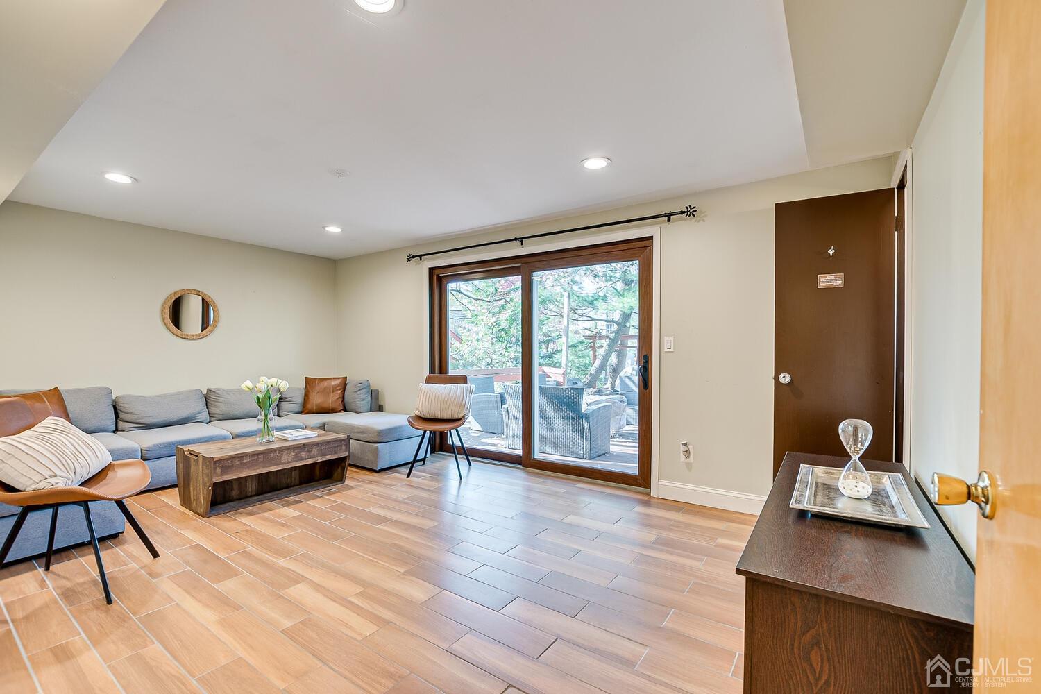 20 Homestead Road Metuchen, NJ 08840 - Photo 30 of 49 a living room with furniture and wooden floor