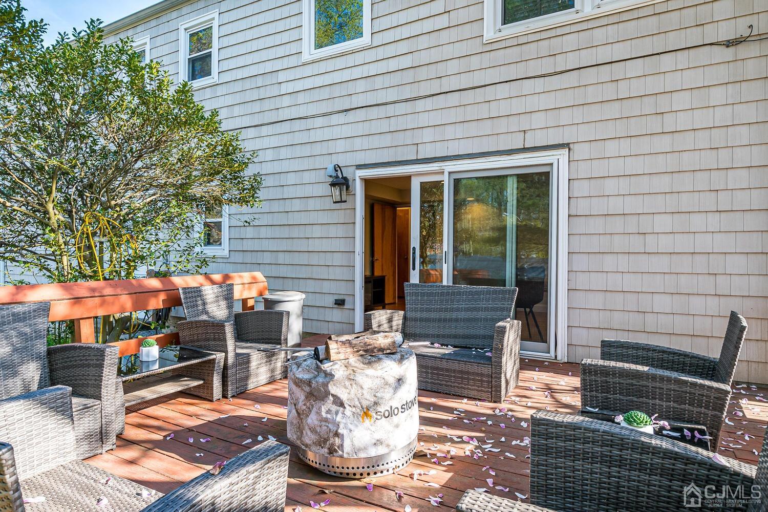20 Homestead Road Metuchen, NJ 08840 - Photo 38 of 49 a outdoor living space with patio furniture and potted plants