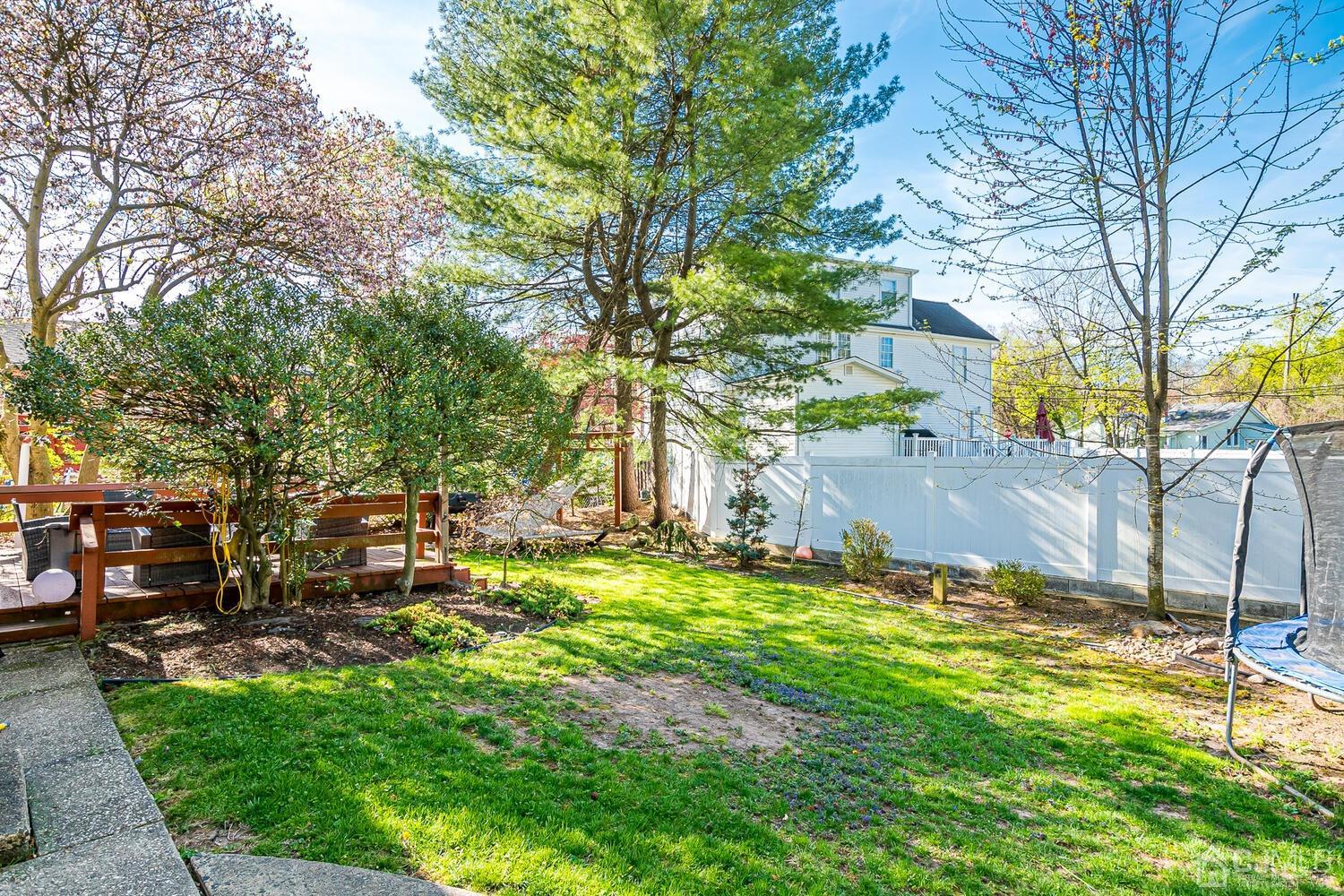 20 Homestead Road Metuchen, NJ 08840 - Photo 40 of 49 a view of a backyard with a sitting area