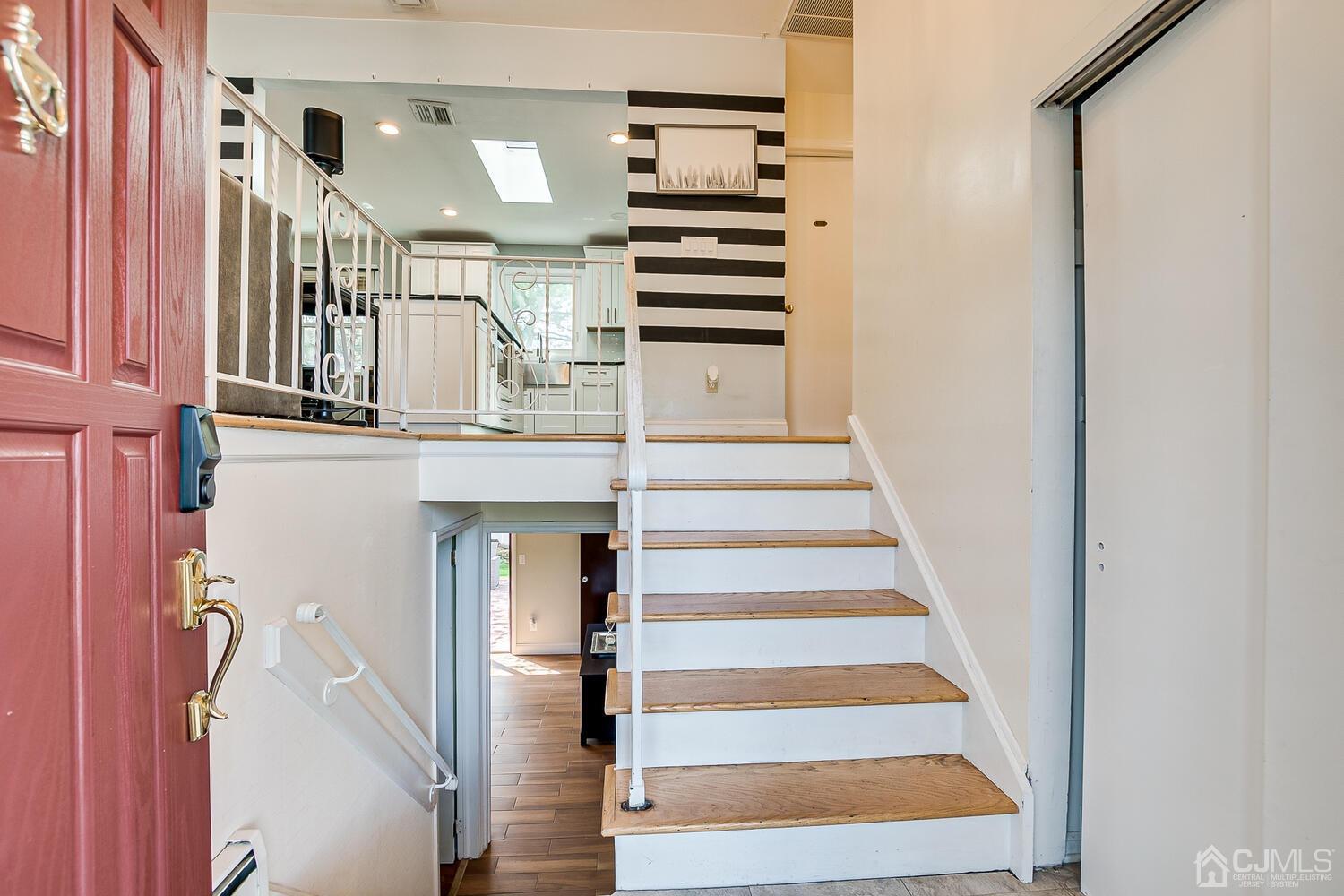 20 Homestead Road Metuchen, NJ 08840 - Photo 10 of 49 a view of entryway and hall with wooden floor