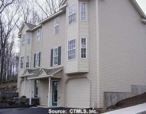 67 Corning Road, Unit 7 7 Norwich, CT 06360 - Photo 1 of 1 a view of a white building