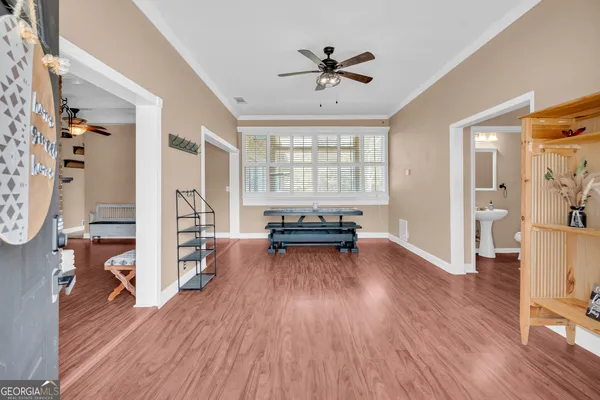 a view of living room with furniture and a flat screen tv