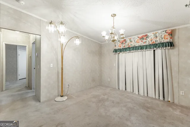 a view of a chandelier in a livingroom