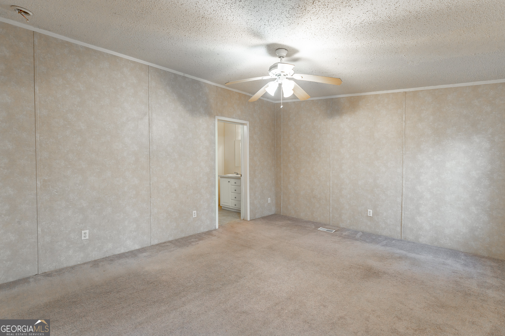 132 Short Hollow Road Trion, GA 30753 - Photo 20 of 46 an empty room with a chandelier fan and a chandelier fan