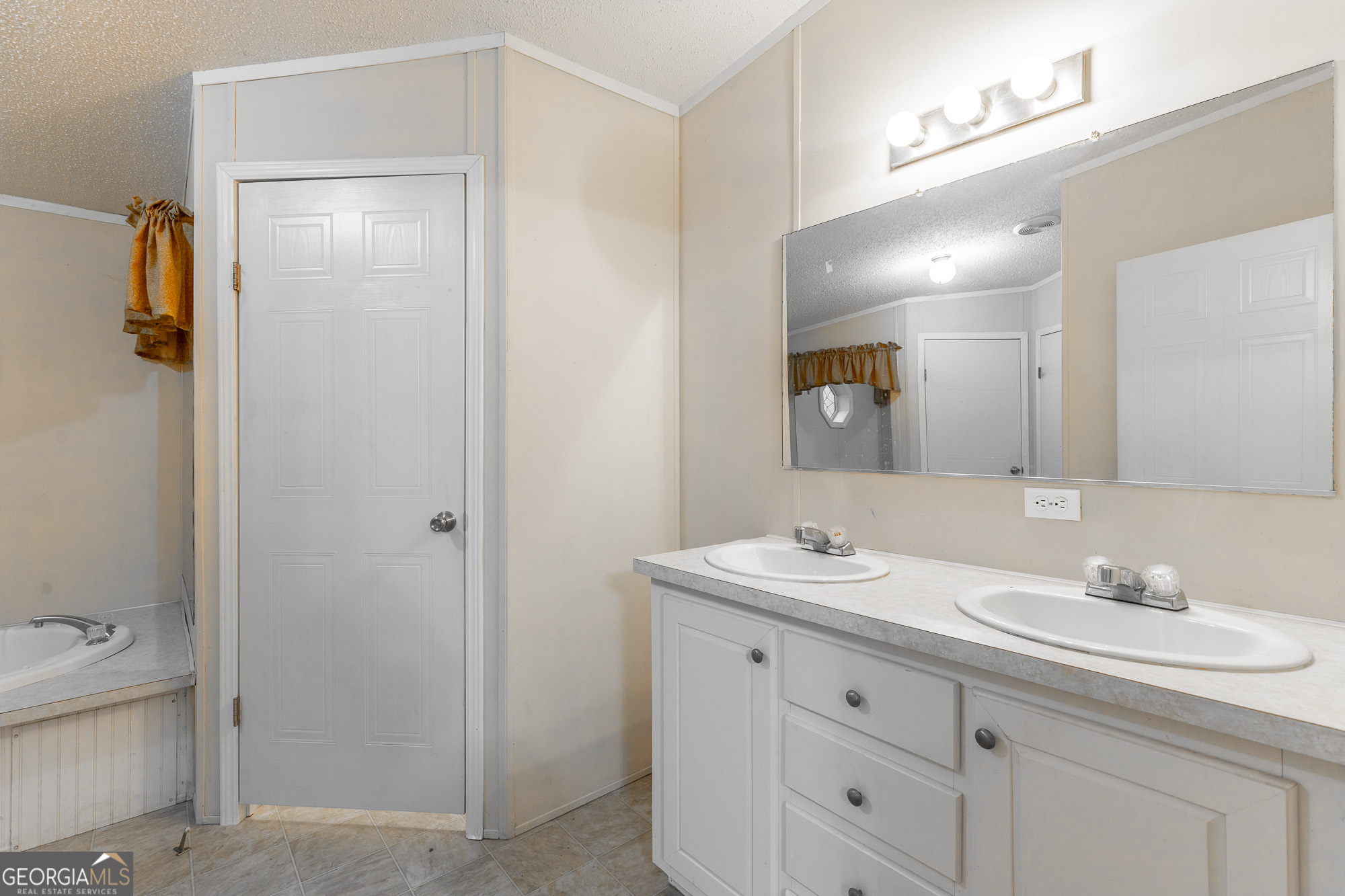 132 Short Hollow Road Trion, GA 30753 - Photo 23 of 46 a bathroom with a sink double vanity and a mirror