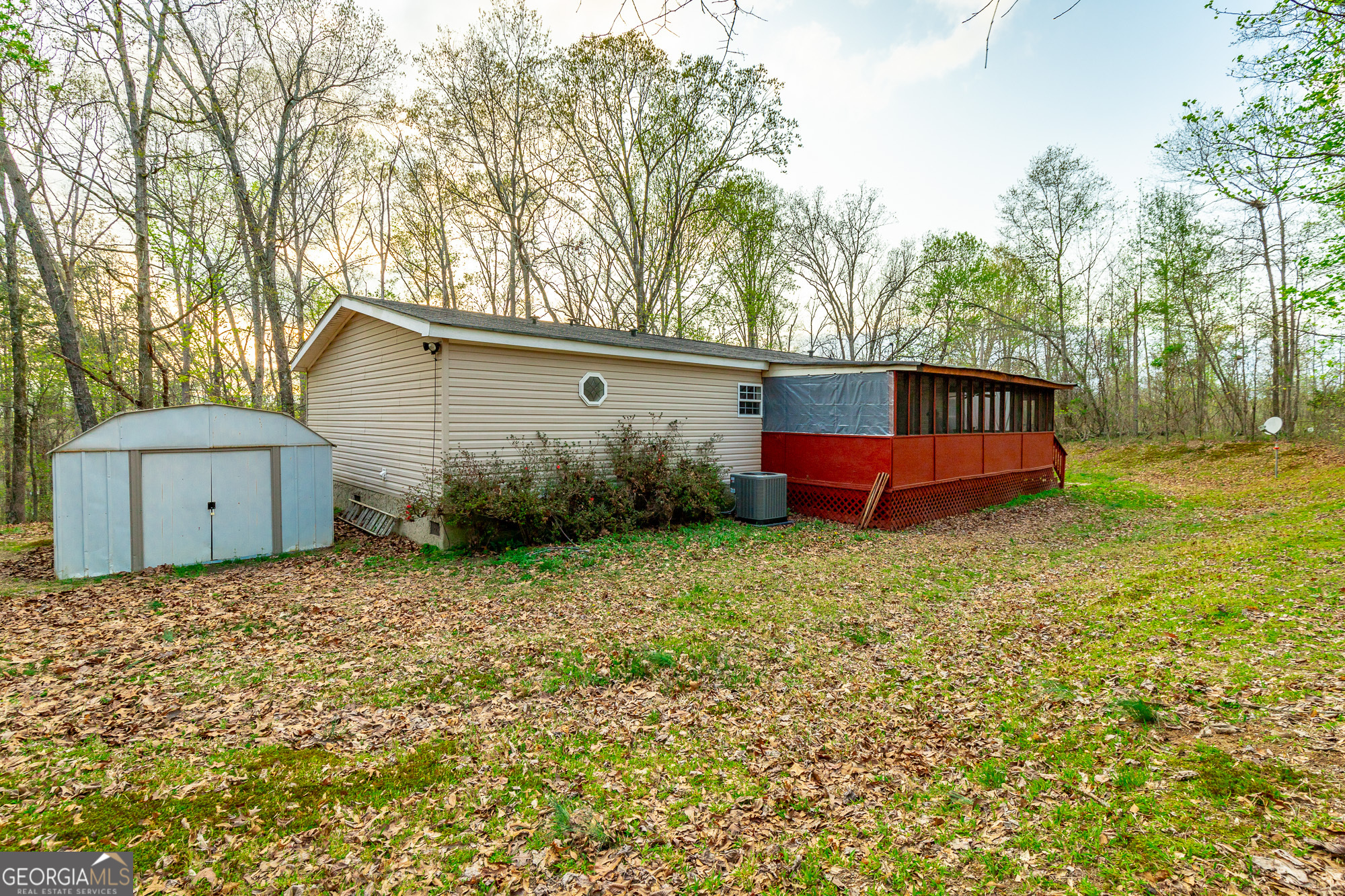132 Short Hollow Road Trion, GA 30753 - Photo 37 of 46 a backyard of a house with trees and entertaining space