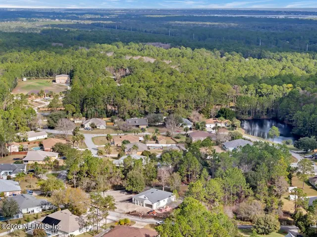 a view of a bunch of trees and houses
