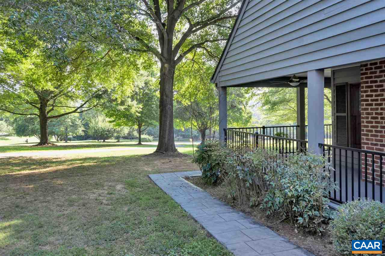 255 Rivanwood Place Charlottesville, VA 22901 - Photo 23 of 25 a view of a house with backyard and sitting area