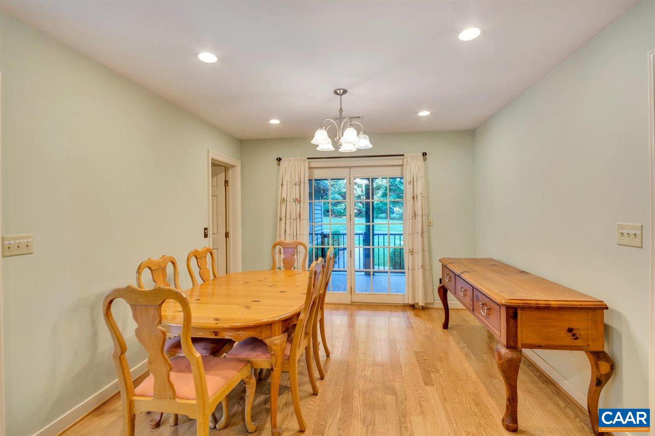 255 Rivanwood Place Charlottesville, VA 22901 - Photo 10 of 25 a view of a dining room with furniture and wooden floor