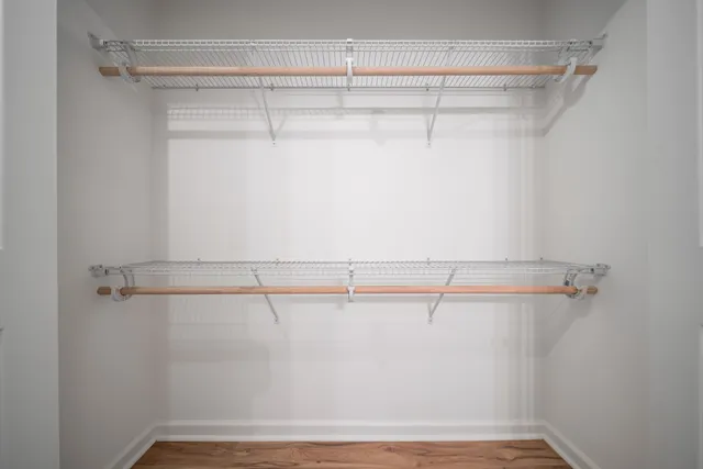a view of a room with racks on the wall