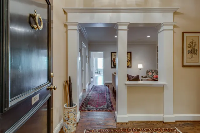 a living room with a mirror