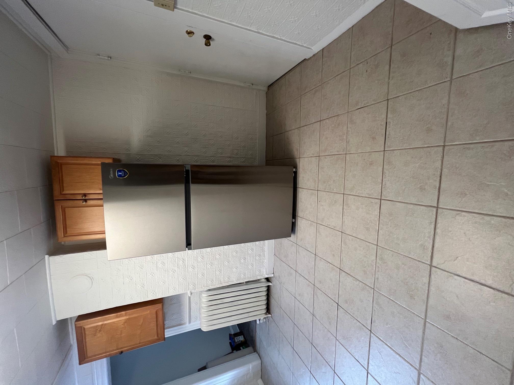418 Christian Herald Road, Unit 1 Valley Cottage, NY 10989 - Photo 4 of 17 Just Painted, tiled floor, new refrigerator