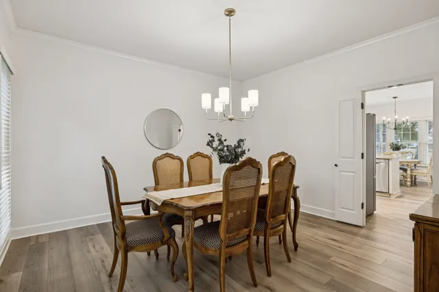 a bathroom with a sink vanity granite tub and a mirror