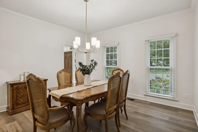 a bath tub sitting next to a window
