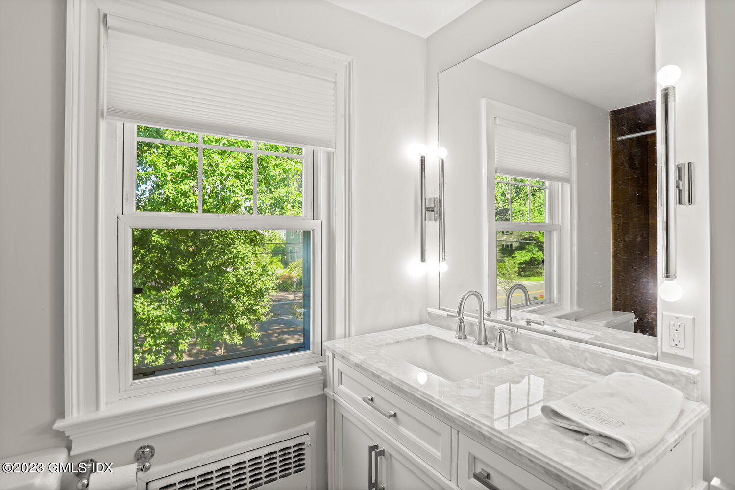 30 Sinawoy Road Cos Cob, CT 06807 - Photo 12 of 21 a bathroom with a granite countertop sink and a window
