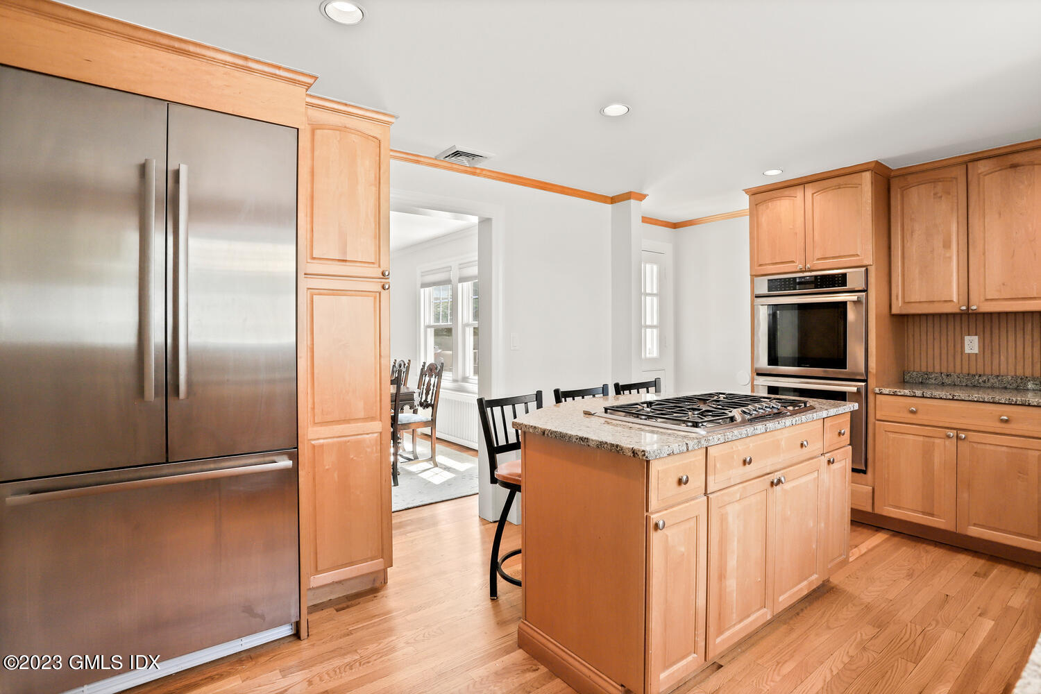 30 Sinawoy Road Cos Cob, CT 06807 - Photo 8 of 21 a kitchen with stainless steel appliances granite countertop a stove a refrigerator and a refrigerator