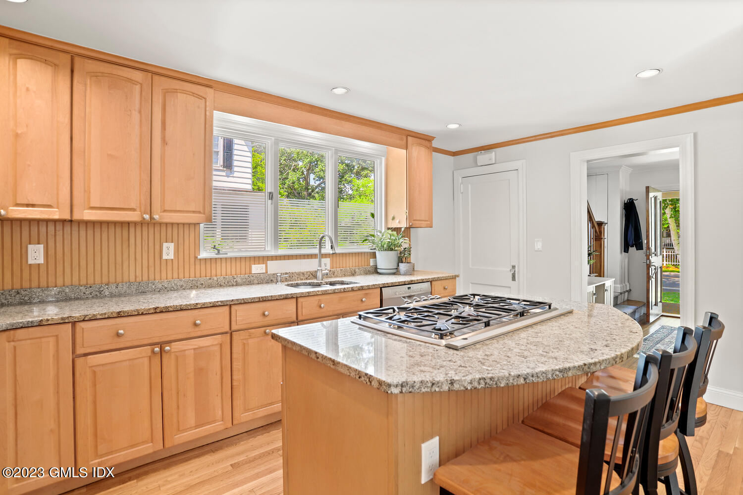 30 Sinawoy Road Cos Cob, CT 06807 - Photo 9 of 21 a kitchen with granite countertop sink stove and granite counter top