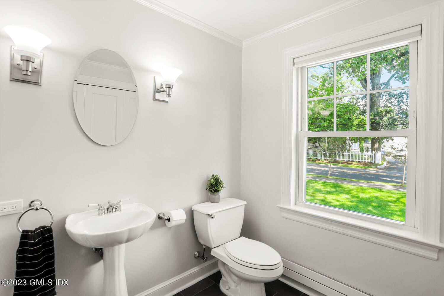 30 Sinawoy Road Cos Cob, CT 06807 - Photo 10 of 21 a bathroom with a sink a toilet and a window