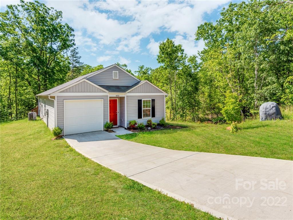 1032 Unity Pointe Lane Kings Mountain, NC 28086 - Photo 2 of 29 a front view of house with yard and green space