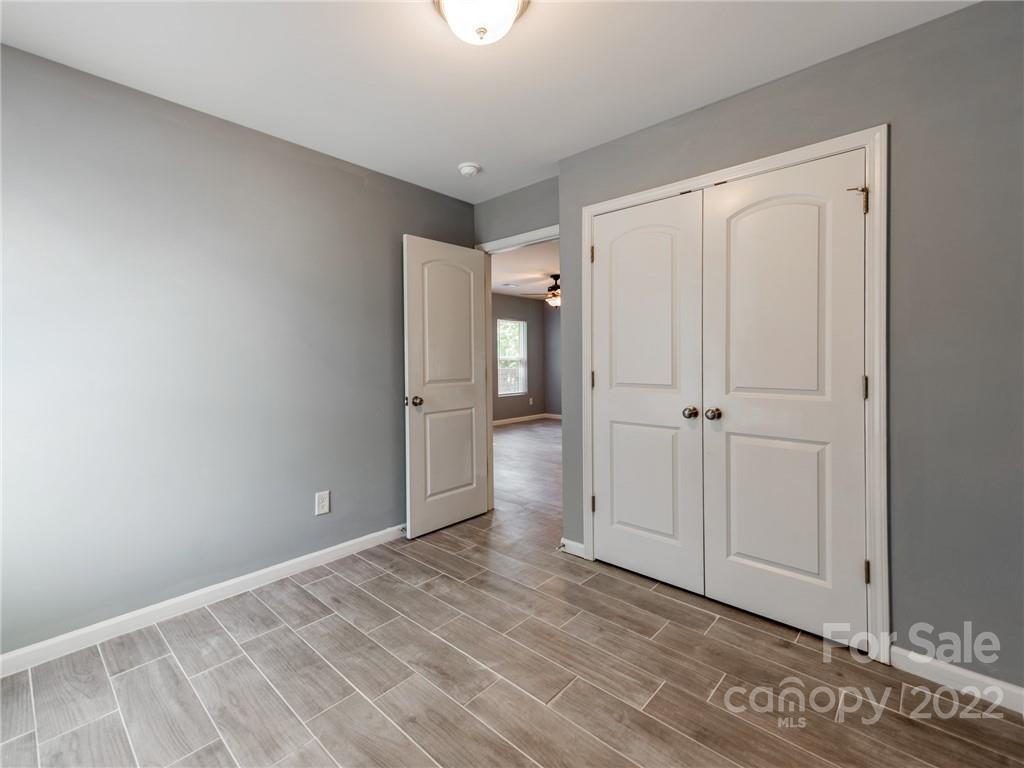 1032 Unity Pointe Lane Kings Mountain, NC 28086 - Photo 21 of 29 a view of empty room with wooden floor