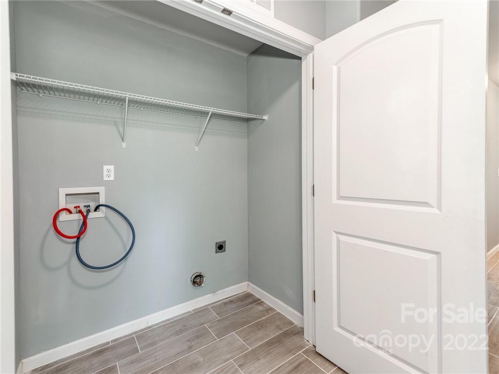 1032 Unity Pointe Lane Kings Mountain, NC 28086 - Photo 23 of 29 a view of a hallway with painted walls