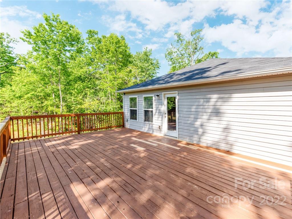 1032 Unity Pointe Lane Kings Mountain, NC 28086 - Photo 27 of 29 a view of backyard with a deck and wooden floor