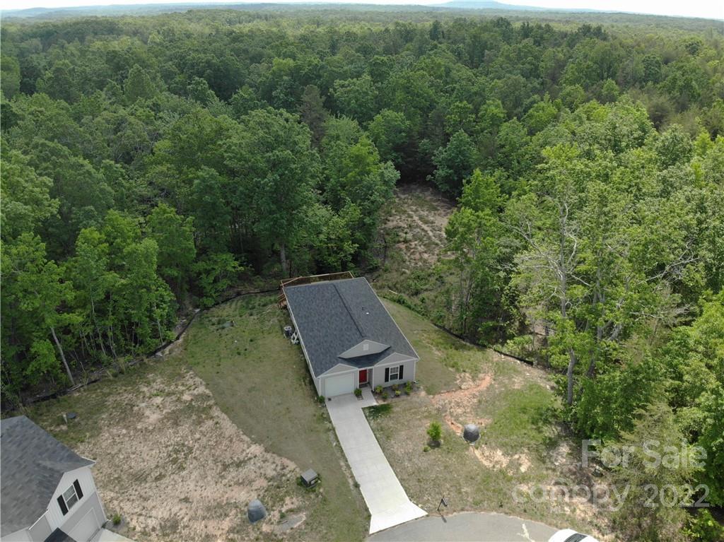 1032 Unity Pointe Lane Kings Mountain, NC 28086 - Photo 29 of 29 a view of a backyard with a garden