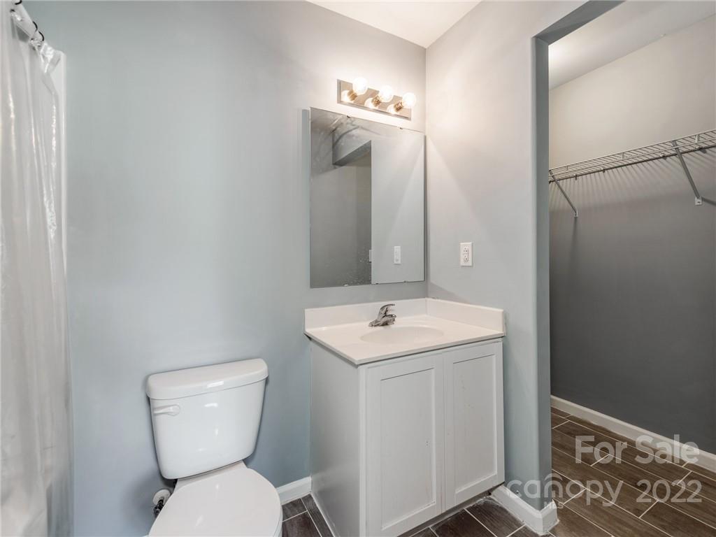 1032 Unity Pointe Lane Kings Mountain, NC 28086 - Photo 8 of 29 a bathroom with a toilet sink and mirror
