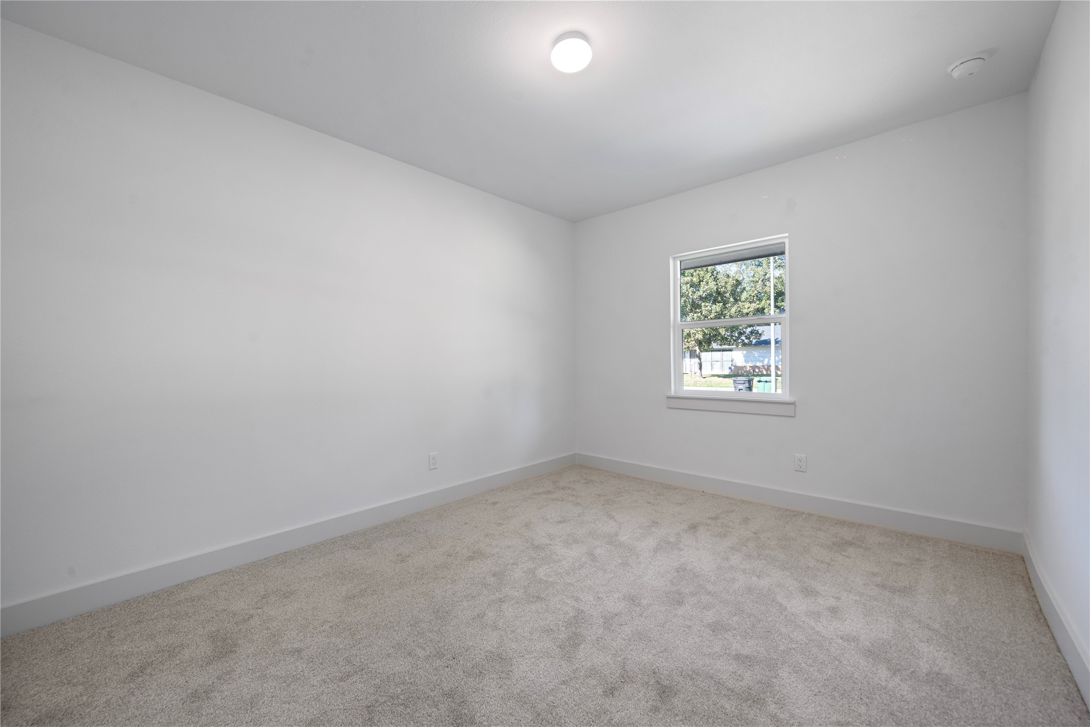 5114 Keystone Street Houston, TX 77021 - Photo 11 of 29 an empty room with a window