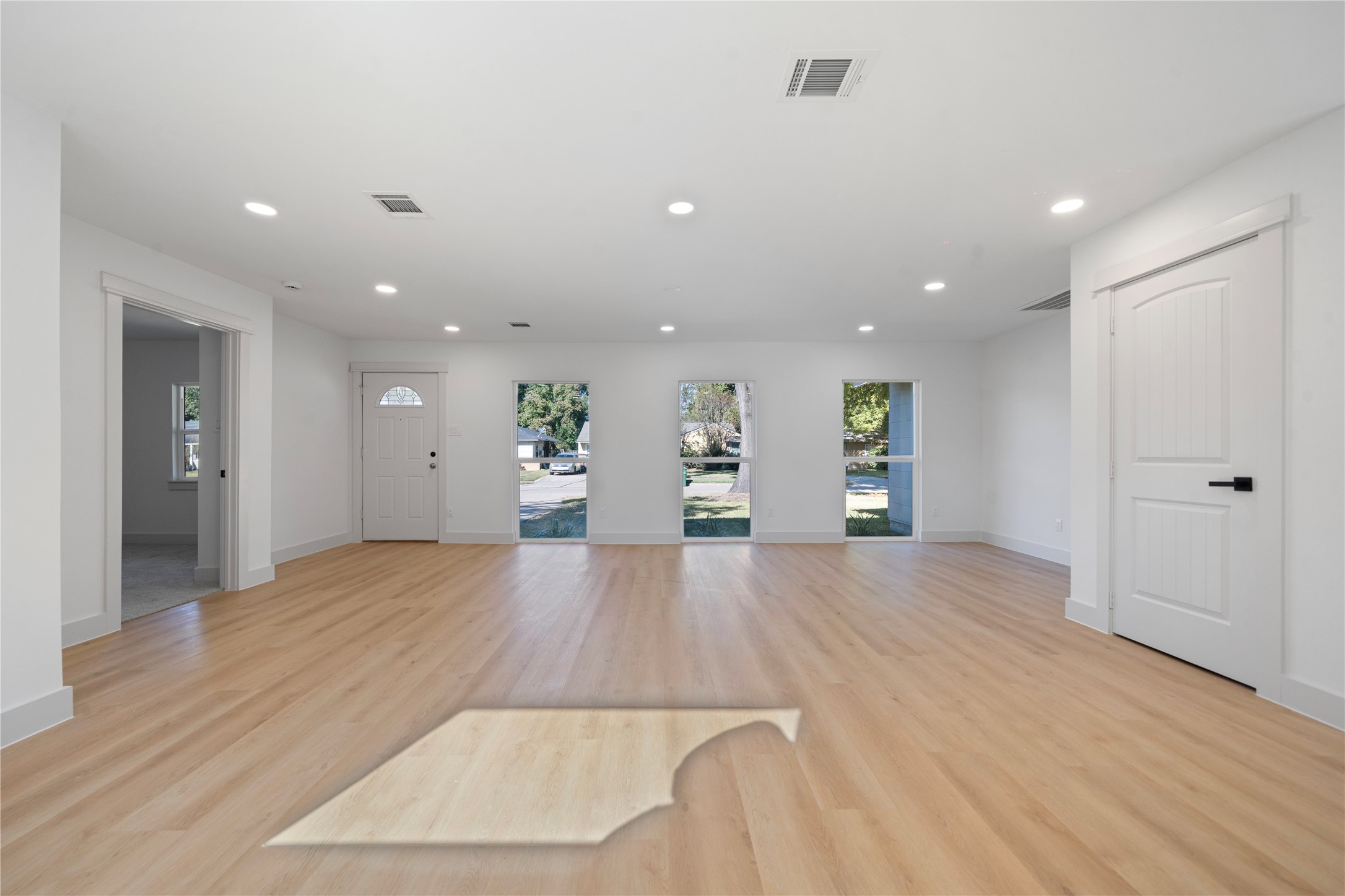 5114 Keystone Street Houston, TX 77021 - Photo 12 of 29 a view of empty room with wooden floor