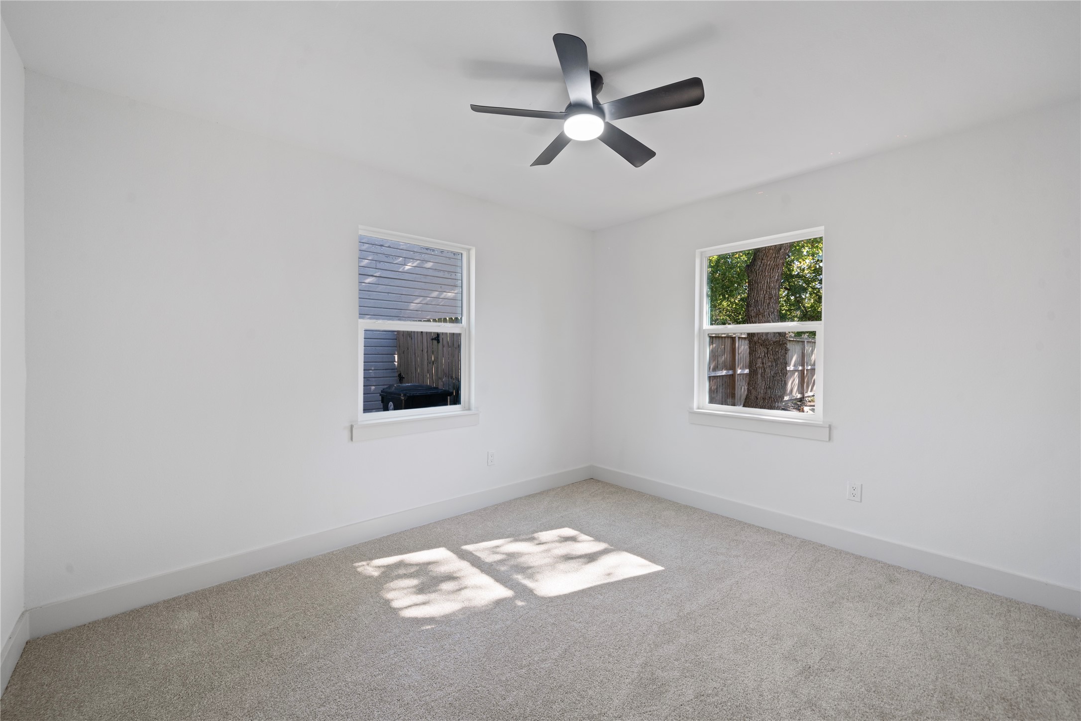 5114 Keystone Street Houston, TX 77021 - Photo 16 of 29 a view of room with window and ceiling fan