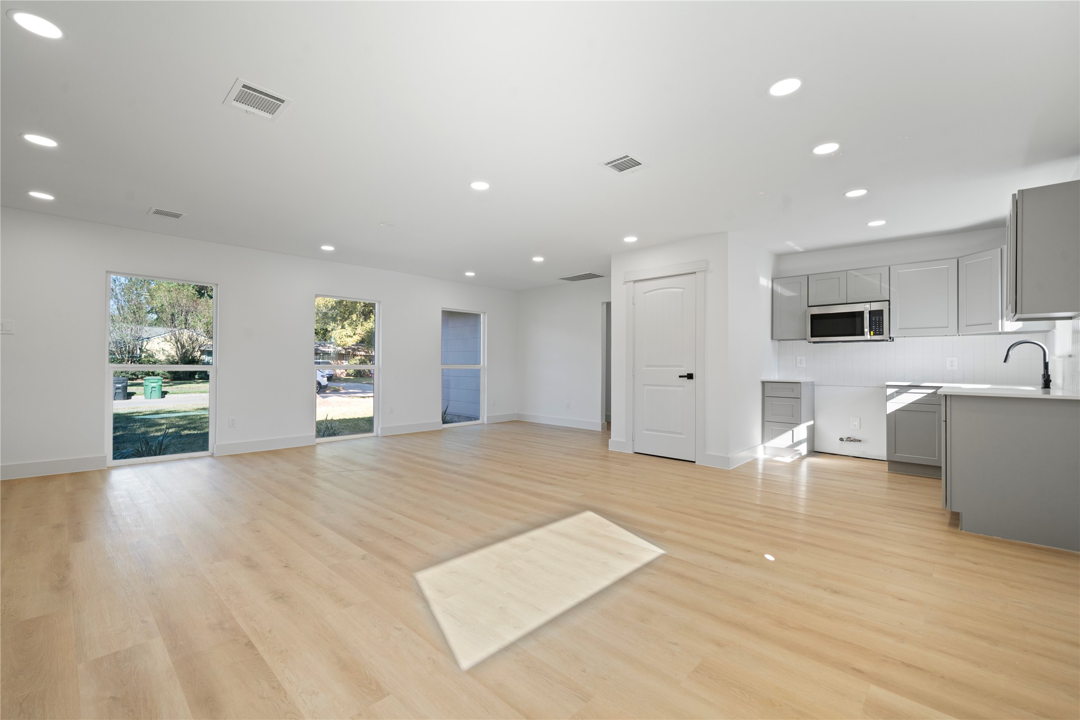 5114 Keystone Street Houston, TX 77021 - Photo 4 of 29 a view of a kitchen with a sink and a refrigerator