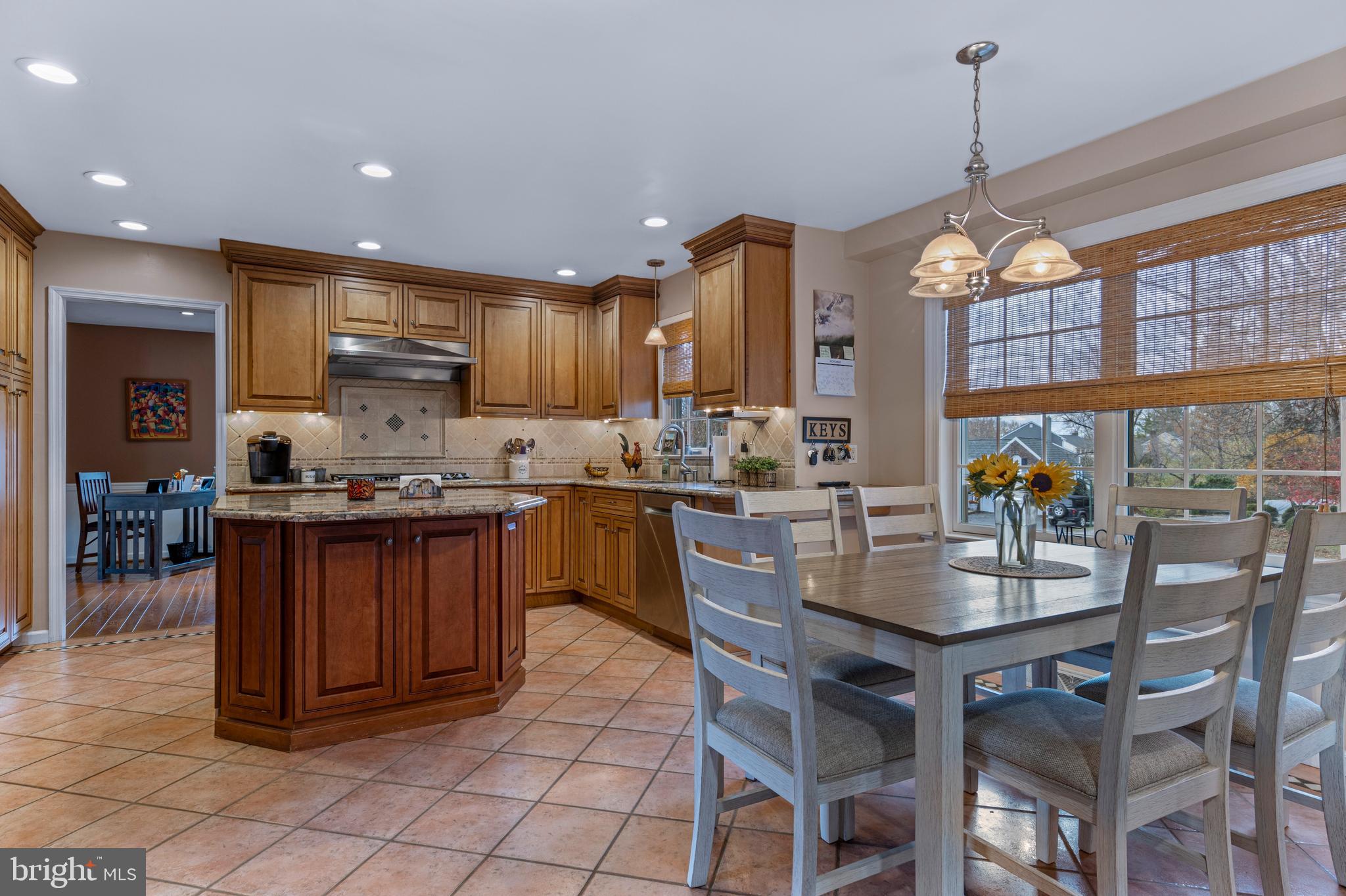 1586 Salomon Lane Chesterbrook, PA 19087 - Photo 15 of 47 a kitchen with stainless steel appliances granite countertop a stove and a refrigerator