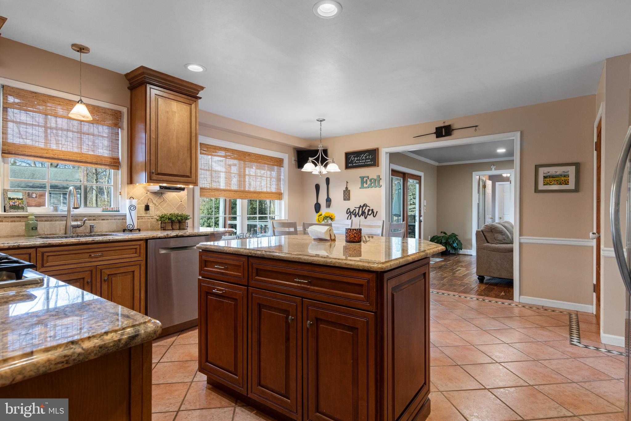 1586 Salomon Lane Chesterbrook, PA 19087 - Photo 19 of 47 a kitchen with granite countertop a sink and cabinets
