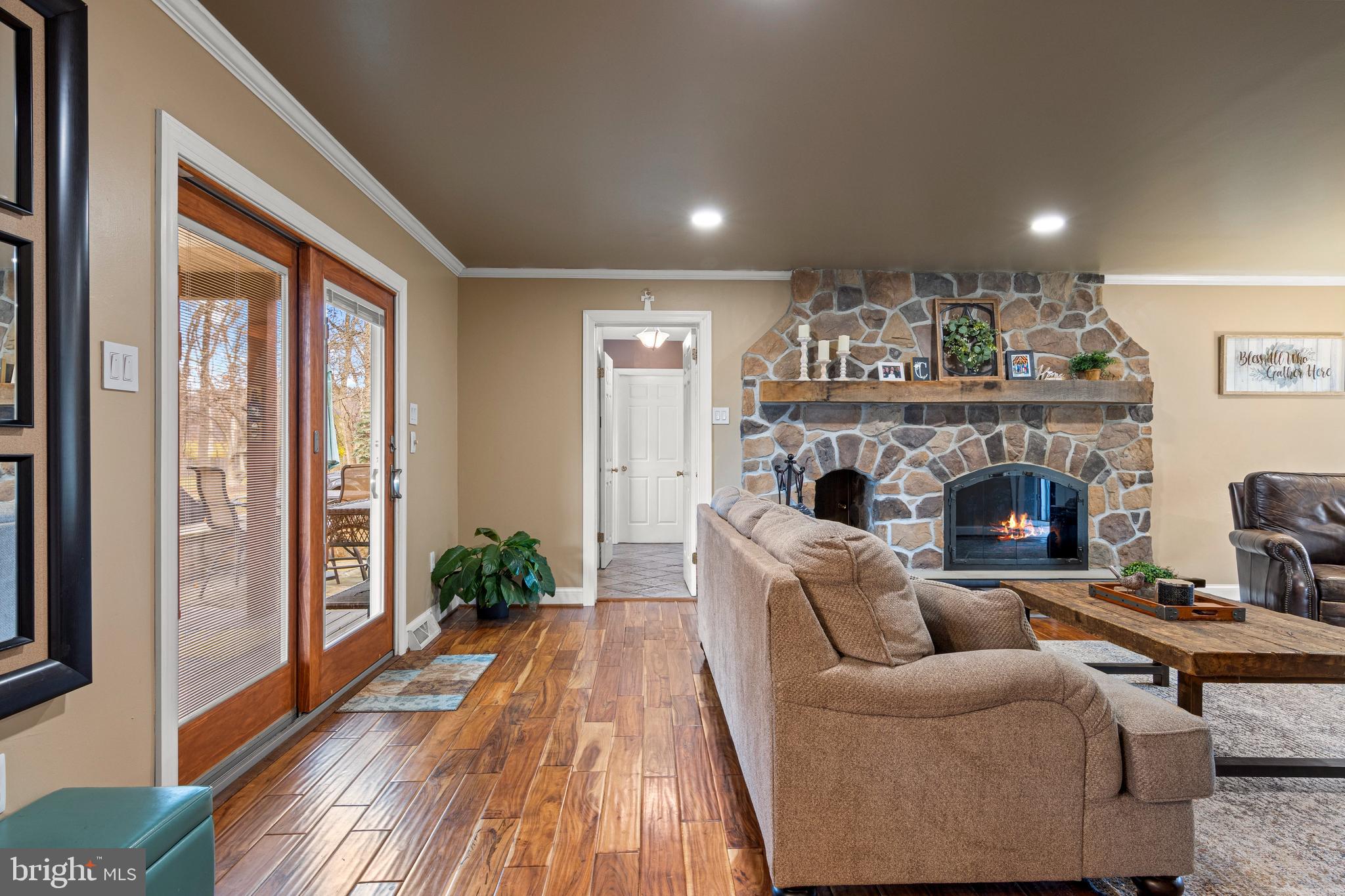 1586 Salomon Lane Chesterbrook, PA 19087 - Photo 22 of 47 a living room with furniture and a fireplace