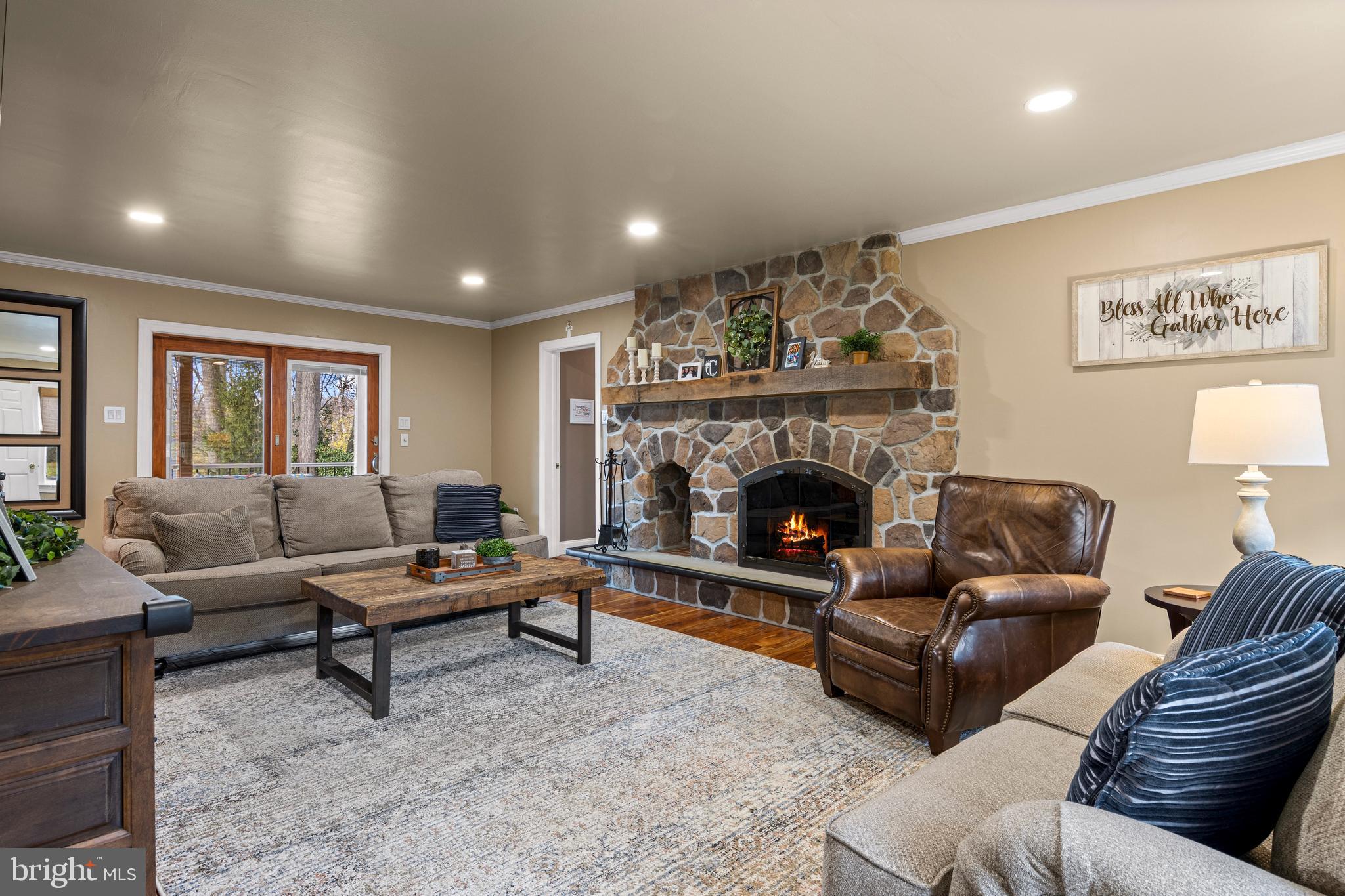 1586 Salomon Lane Chesterbrook, PA 19087 - Photo 24 of 47 a living room with furniture and a fireplace