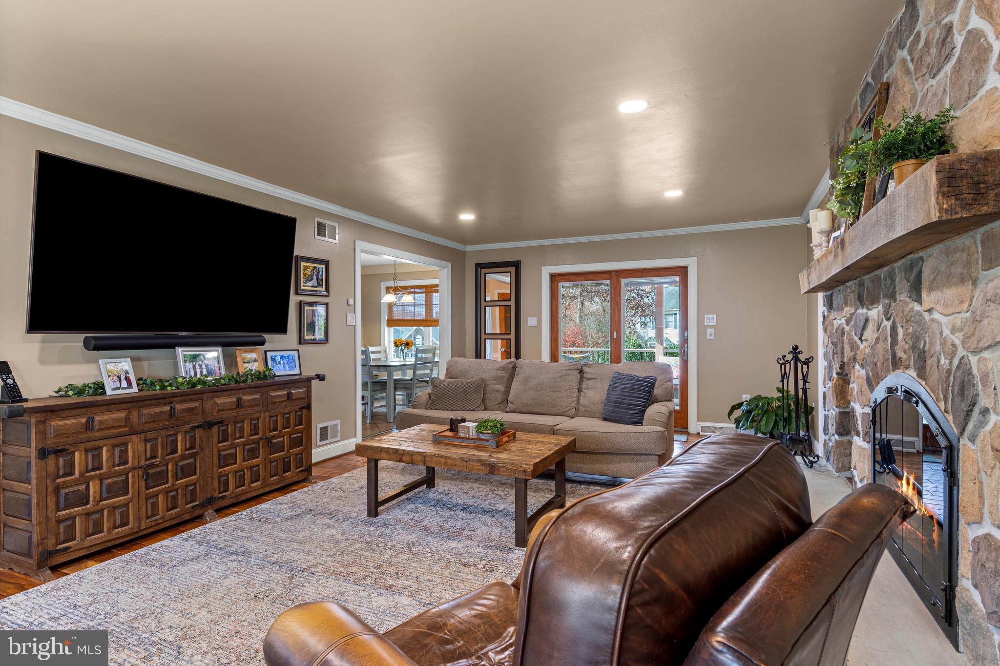 1586 Salomon Lane Chesterbrook, PA 19087 - Photo 25 of 47 a living room with furniture and a flat screen tv