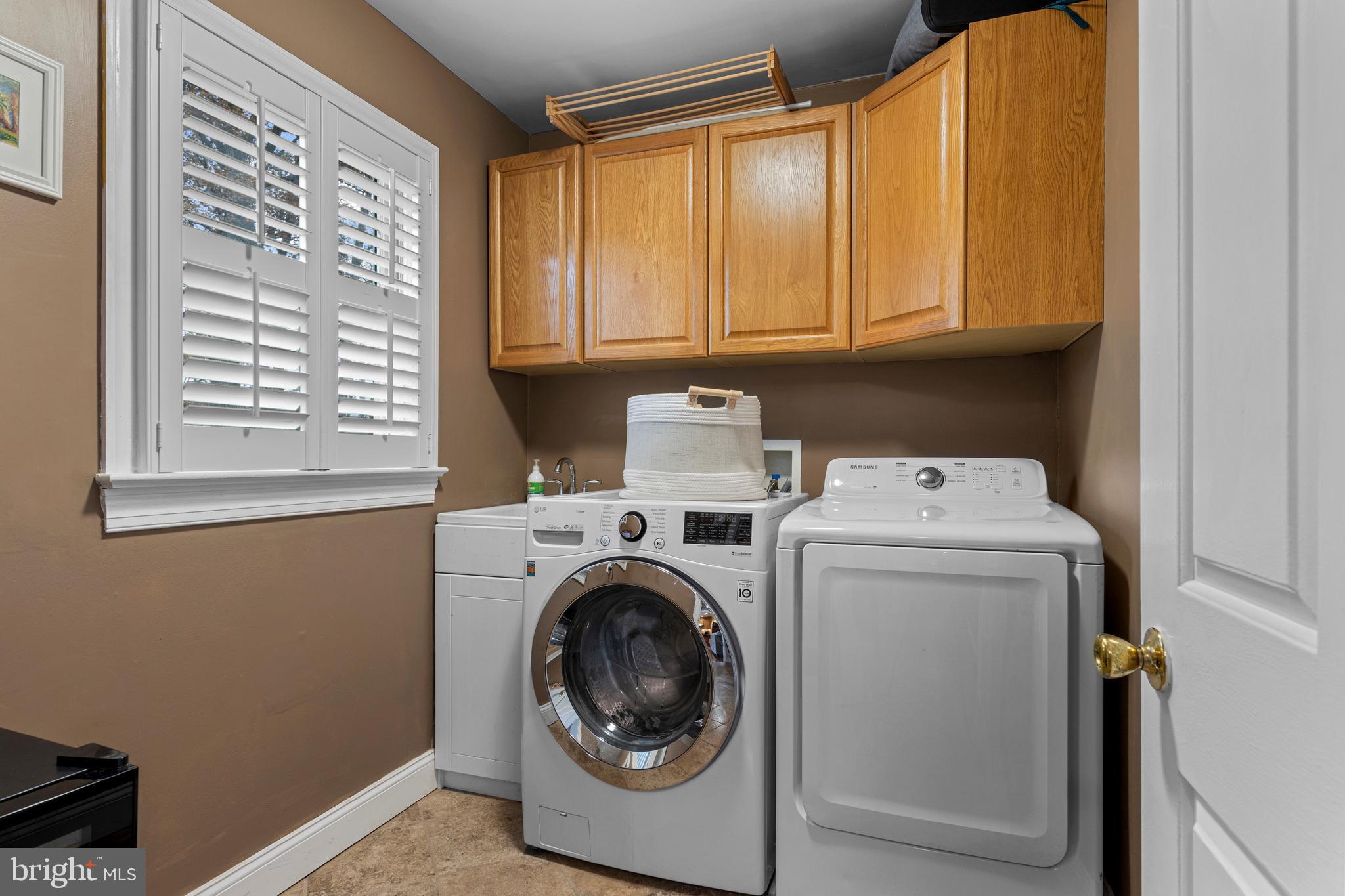 1586 Salomon Lane Chesterbrook, PA 19087 - Photo 29 of 47 a utility room with dryer and washer