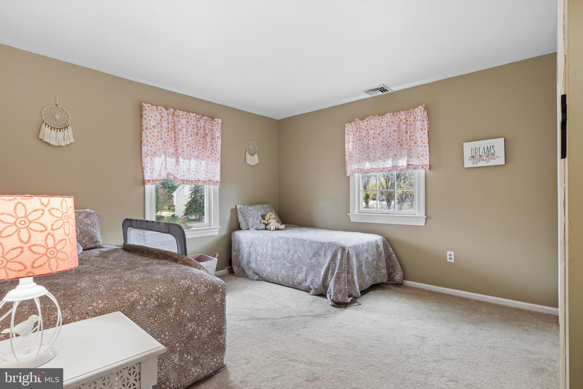 1586 Salomon Lane Chesterbrook, PA 19087 - Photo 43 of 47 a spacious bedroom with two beds and a window