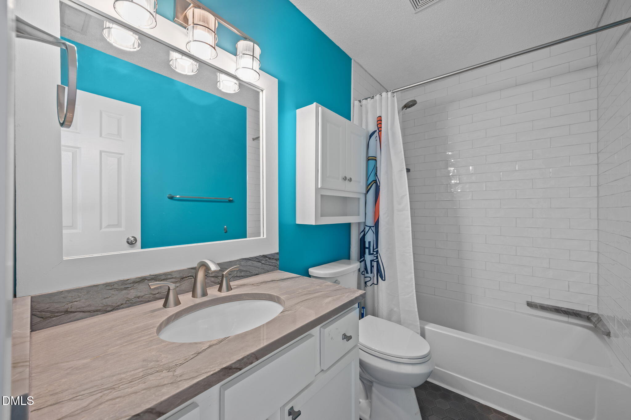 2214 Pathway Drive Chapel Hill, NC 27516 - Photo 17 of 34 a bathroom with a granite countertop sink toilet and shower