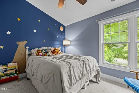 a kitchen with stainless steel appliances a sink stove and cabinets