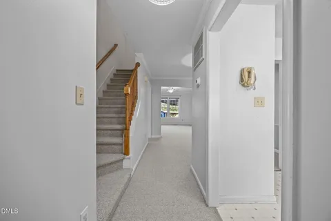 a view of a house with furniture and a fire pit